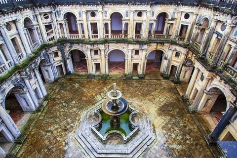 Looking down at the inner courtyard with multiple archways and entrances surroun Stock Photos