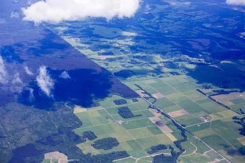 Looking down on land deforested to make way for farmland flying south from Sa Stock Photos