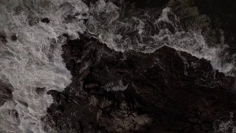 Looking down on Lighthouse and rocks2 Stock Footage 84747859