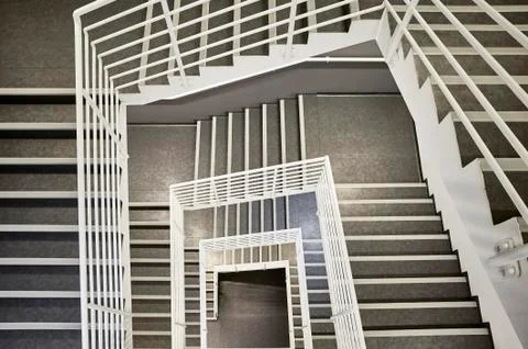 Looking down at a modern staircase. Stock Photos