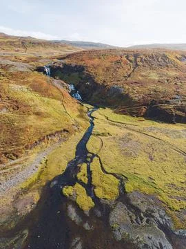 Looking down at mossy landscape around waterfalls in Iceland Stock Photos