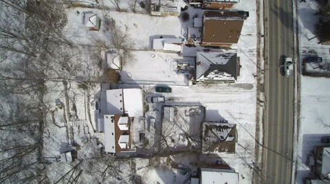 Looking Down at The Old Neighborhood in the winter Snow Stock Footage 61839919