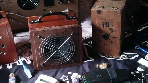 Looking down over collection of spirit and ghost box paranormal electronic Video stock 247607290