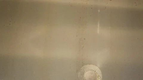 Looking down over traffic in the city at night 스톡 동영상 254036700