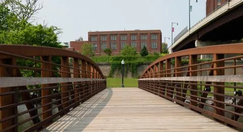 Looking Down Pedestrian Bridge Over River Stock Photos