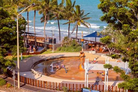 Looking Down Onto People Enjoying A Beachfront Waterpark Stock Photos