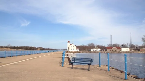 Looking down the pier to the shore at Pere Marquette, Michigan, 4k60p Video stock 128852452