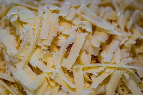 Looking down at a pile of grated cheese Stock Photos