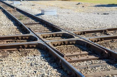 Looking down on the railroad tracks in a train yard. Stock Photos