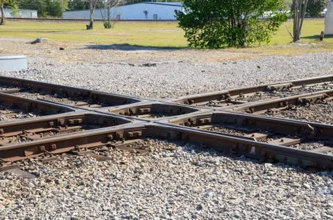 Looking down on the railroad tracks in a train yard. Stock Photos