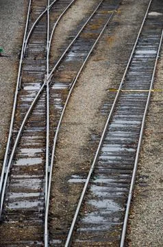 Looking down on the railroad tracks in a train yard. Stock Photos