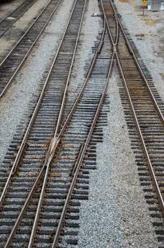 Looking down on the railroad tracks in a train yard. Stock Photos