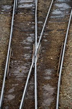 Looking down on the railroad tracks in a train yard. Stock Photos
