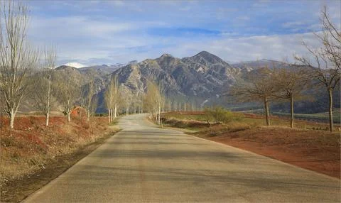 Looking down a remote road in the Sierra Nevada Mountains Stock Photos
