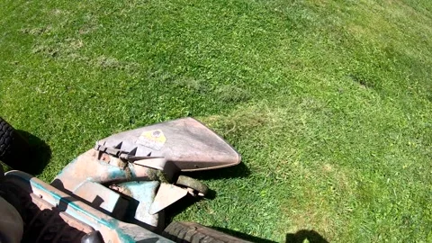 Looking Down on a Riding Mower Discharge Chute Stock Footage 154012715