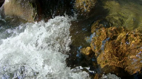 Looking down at river as rapids form in the shallow water Stock Footage 160486435
