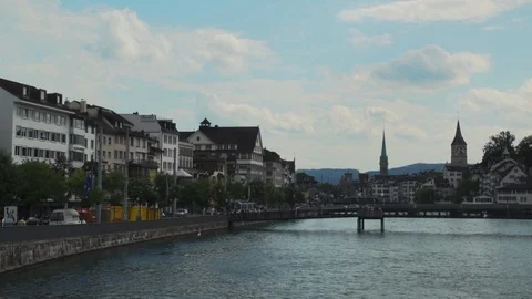 Looking down the river towards a bridge in Zurich Switzerland Stock Footage 89295260