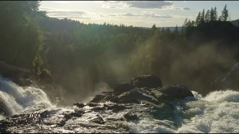 Looking Down a Rocky Waterfall, Drone Stock Footage 99295561