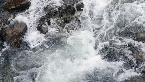 Looking down onto rushing waterfall Stock Footage 93800073