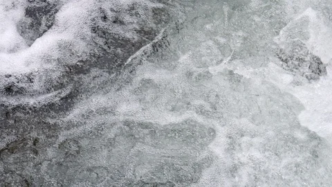 Looking down into rushing waterfall Stock Footage 93800951