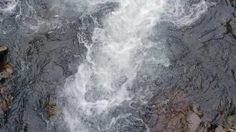 Looking down into rushing waterfall Stock Footage 93800966