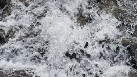 Looking down into rushing waterfall Stock Footage 93800971