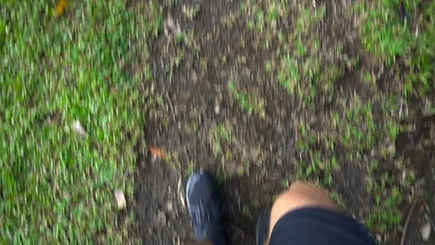 Looking Down On Shoes And Legs While Walking On Grass [Slow Motion] Stock Footage 88884093