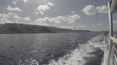 Looking down the side of a boat off the western coast of Oahu, Hawaii Stock Footage 49910484