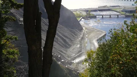 Looking down at the side of a rocky mountain beside the Montmorency Falls Stock Footage 62649239