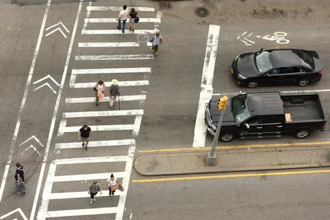 Looking down from skyscraper on the busy streets in New York Stock Photos