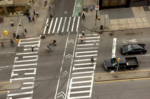Looking down from skyscraper on the busy streets in New York. Stock Photos