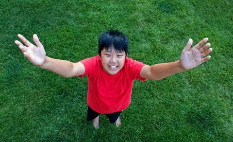 Looking down on a smiling boy Stock Photos