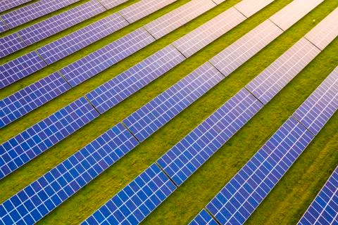 Looking down on to solar panels at sunrise