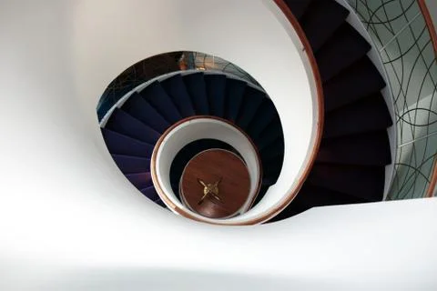 Looking down a spiral staircase Stock Photos