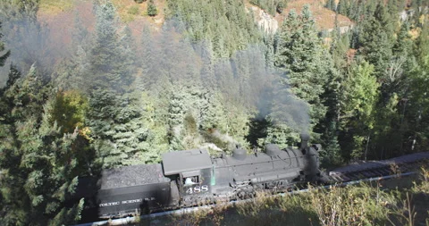Looking Down at Steam Locomotive Train Cumbres and Toltec in the Fall Stock Footage 259679538