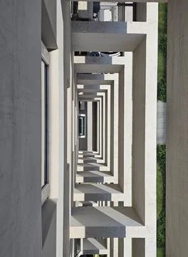 Looking Down Through Nested Concrete Frames of a Modern Building Stock-Fotos
