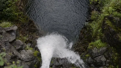 Looking down from the top of a waterfall on the Hawaiian island of Maui. Stock Footage 76164559