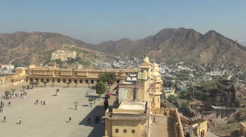 Looking down a tourists in the courtyard of the famous fort at Amber in India Stock Footage 24631493