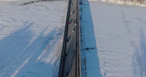 Looking Down At Traffic On 169 Bridge In Winter Champlin Minnesota - Drone Stock Footage 228894027