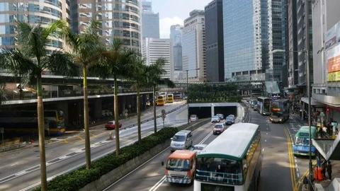 Looking down at traffic on Connaught Road - Hong Kong Stock Footage 72715609