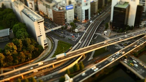 Looking down at traffic going by in Tokyo Japan Video stock 127294692