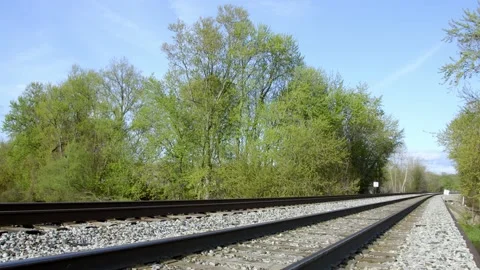 Looking down the train tracks. 4k60p Stock Footage 130815184