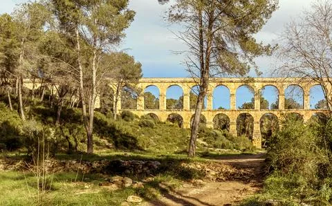 Looking down the valled at the ancient Roman viaduct dating back to the 1st.. Stock Photos