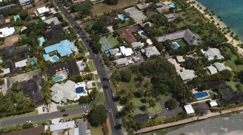 Looking down on Waialae-Kahala residential area and water along beach. Shot in Stock Footage 59509562