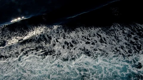Looking Down at the Wake of a Large Ship Stock Footage 123413043