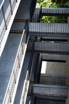 Looking down on walkways showing pattern of mixed materials stone metal and.. Stock Photos