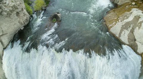 Looking down a water fall from the snake river Stock Photos