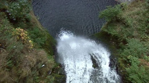Looking down the waterfall in slow motion. Stock Footage 8683391