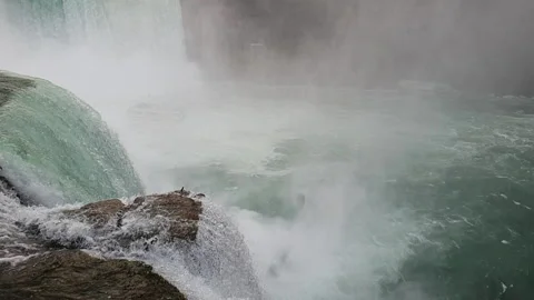 Looking down waterfalls into Niagara Gorge Stock Footage 142161054