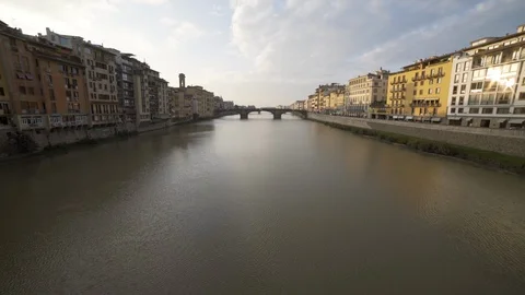 Looking downstream of the Arno from one bridge to another in Florence Stock Footage 103213275